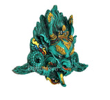 Teal Kirtimukha wall hanging resin, profile view with gold crown and detailed eyes
