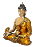 Buda dourado sentado em perfil lateral, mão em flor e tigela ao centro