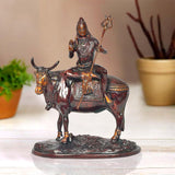 Brass Lord Shiva seated on Nandi figurine holding trident, 9 inch home temple decor