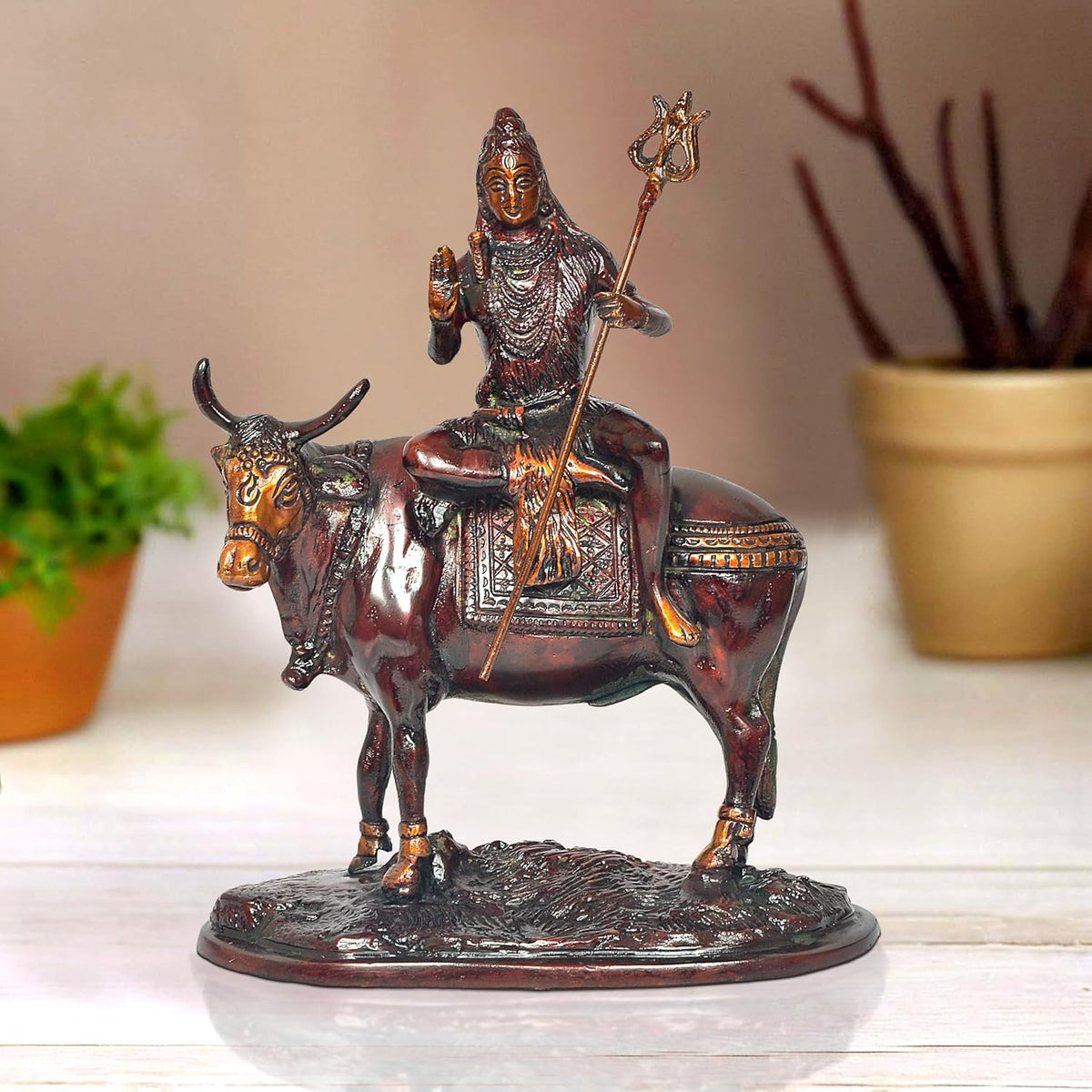 Brass Lord Shiva seated on Nandi figurine holding trident, 9 inch home temple decor