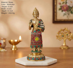 Brass standing Buddha idol on white base, Abhaya mudra, multicolor jeweled red robe