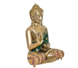 Brass Buddha idol in Abhaya mudra, green robe, detailed patterned cushion and base