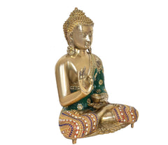 Brass Buddha idol in Abhaya mudra, green robe, detailed patterned cushion and base