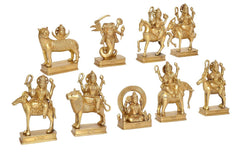 Brass Navagraha nine-deity sculpture set, detailed figures on square bases with raised arms