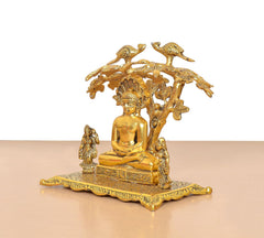 Mahavir Swami metal idol, angled view with bird canopy and seated figure
