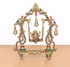 Ganesha swing idol statue on brass swing with multicolor trim and four hanging bells