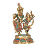 Brass dancing Radha-Krishna statue, front view, red-and-green patterned garments, raised arms
