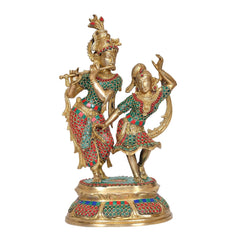 Brass dancing Radha-Krishna statue, front view, red-and-green patterned garments, raised arms