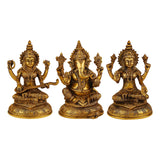 Brass Lakshmi Ganesha Saraswati idol set, close front view of three figures