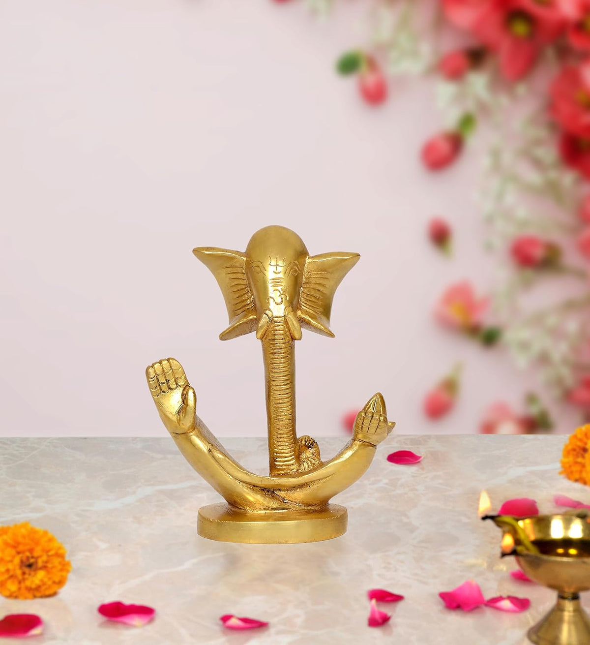Gold-tone modern Ganesha idol statue with raised hands on round base, 5 inch height