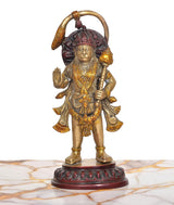 Brass Hanuman Ji standing statue holding mace and blessing hand, gold and dark red