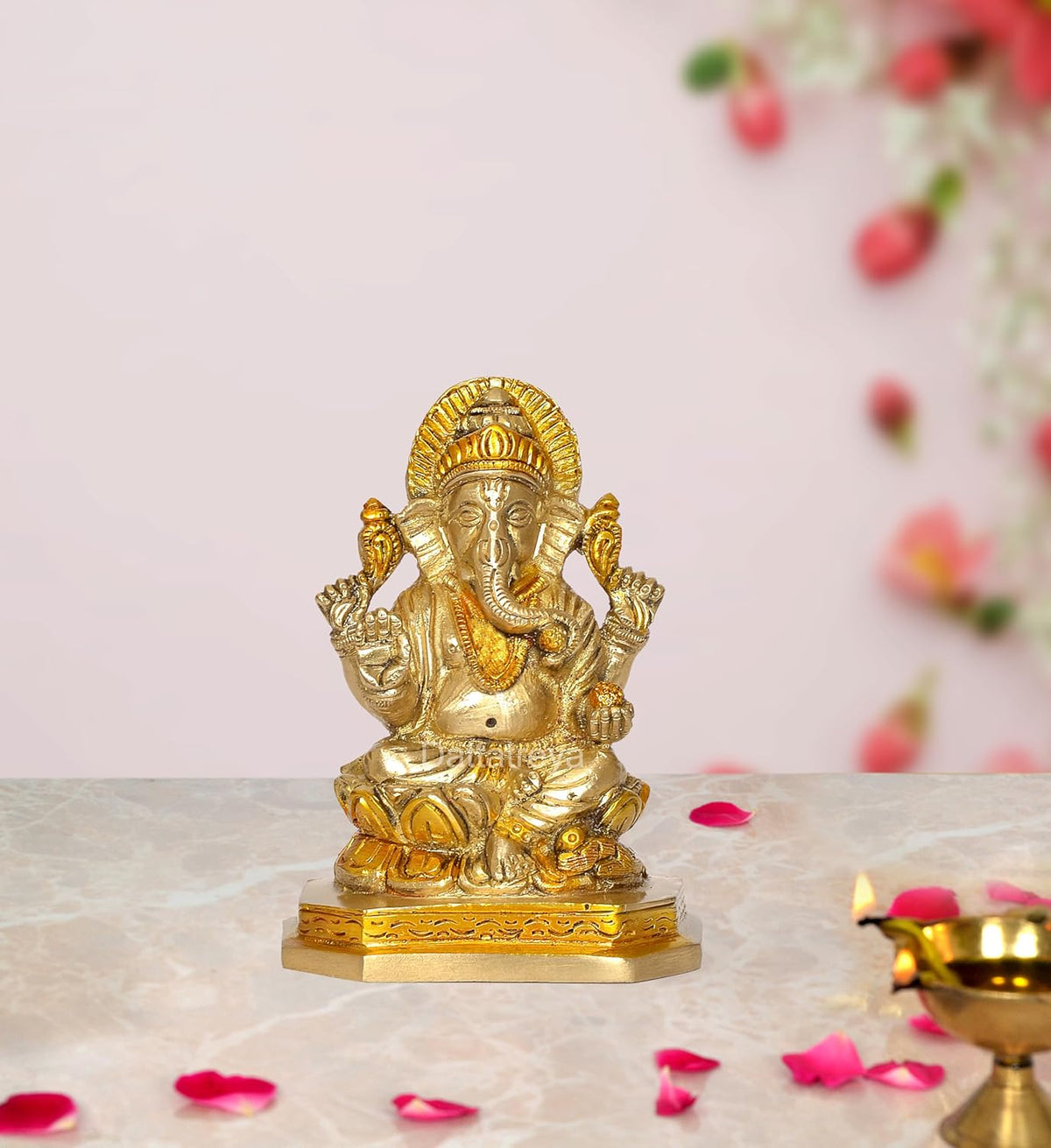 Brass Ganesha idol statue, seated with raised hands, ornate pedestal base