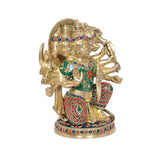 Brass Panchmukhi Hanuman idol, angled view with green and red gem details on torso and waist
