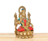 Lakshmi brass statue three-quarter view, gold details, multicolor jeweled clothing