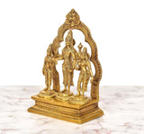 Brass Vishnu statue with Shridevi and Bhudevi, side view showing pedestal and faces