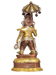 Brass Ganesha idol rear view, parasol overhead, textured drape and decorative belt