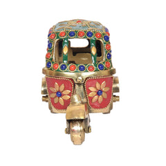 Brass auto rickshaw figure, front view with green beaded canopy and red decorative side panels