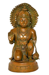 Brass Hanuman seated statue with raised hand and beaded chest ornaments, close front