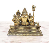 Shiv Parivar bronze murti close side: central figure holding trident, patterned pedestal