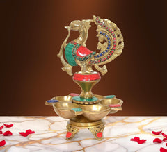 Brass oil lamp with peacock motif, five diya dish stand, colorful inlays