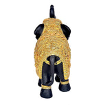 Back view resin elephant figurine with detailed gold patterned robe and upright tail