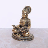 Brass Maa Annapurna murti, side view seated with detailed hands and jewelry
