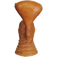 Brass Shiva-Nagaraja statue back: textured cobra hood and coiled body