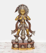 Brass standing Hanuman murti with curved halo, star-like ornaments, and decorated pedestal
