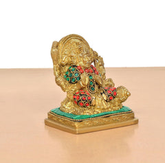 Panchmukhi Hanuman idol side view, teal pedestal and red-green bead accents