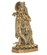 Brass Radha-Krishna idol statue rear/side view, ornate halo and layered garments