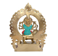 Back view brass Durga Maa statue with multicolor halo and lion figure on pedestal