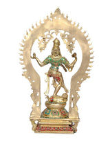 Back view brass Shiva idol with openwork teal halo, multicolor outfit, ornate pedestal