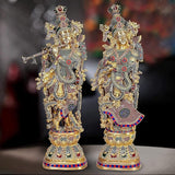Brass Radha Krishna statue front view, detailed crowns, jeweled mesh outfits