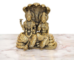 Maa Lakshmi and Lord Vishnu brass idol, seated together on multi-coil Sheshnag base
