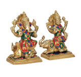 Brass Lakshmi & Ganesha idols, gold-tone figures with green red blue painted decorations