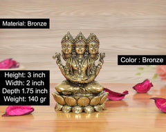 Bronze Brahma Ji idol, three crowned faces; height 3 inch, on lotus base