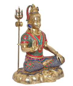 Brass Shiva murti with trident, seated legs, detailed colorful stone inlay