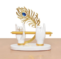 Front view: white resin Krishna hands with gold flute and blue peacock crown, round base
