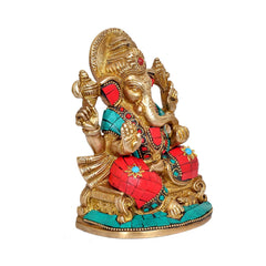 Brass Ganesha statue with multicolor inset stone details, side view