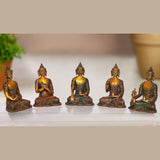 Set of five brass cosmic Buddha statues, seated meditative figures with haloed heads