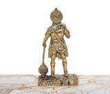 Brass Hanuman Ji standing statue, rear view with ornate halo and decorative belt