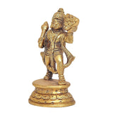 Brass Hanuman idol three-quarter view, detailed armor and large raised shield