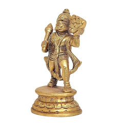 Brass Hanuman idol three-quarter view, detailed armor and large raised shield