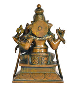 Brass Ganesha with Siddhi idol, back view with patterned detailing and disc