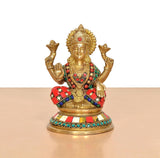 Brass Lakshmi idol statue, seated pose with detailed crown and multicolor ornaments.