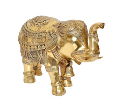 Brass elephant figurine, rear side view with decorative patterns on back and tail