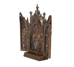 Side view of bronze resin church gate statue with Jesus, saints, and cross top.