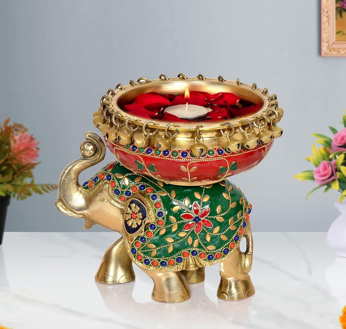Brass elephant urli candle stand with red bowl, green base, jeweled trim