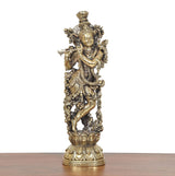 Brass Lord Krishna idol playing flute, detailed jewelry and crown, full view