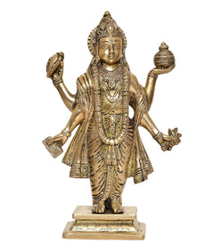 Brass Dhanvantri statue, front view, gold-tone finish, raised hands and ornaments.